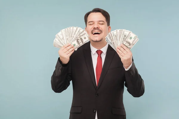 Щасливий Бізнесмен Тримає Доларові Банкноти Світло Блакитному Фоні — стокове фото