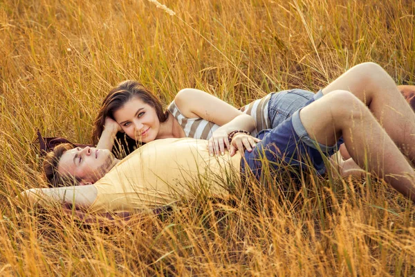 Loving Couple Lying Floral Field Autumnal Park Warm Sunny Day — Stock Photo, Image