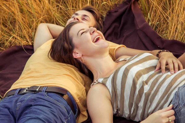 Loving Couple Laughing Lying Floral Field Autumnal Park Warm Sunny — Stock Photo, Image