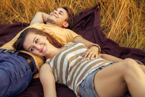 Loving Couple Lying Floral Field Autumnal Park Warm Sunny Day — Stock Photo, Image
