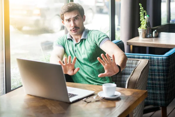 Young Scared Businessman Green Shirt Looking Afraid Face Showing Camera — Stock Photo, Image