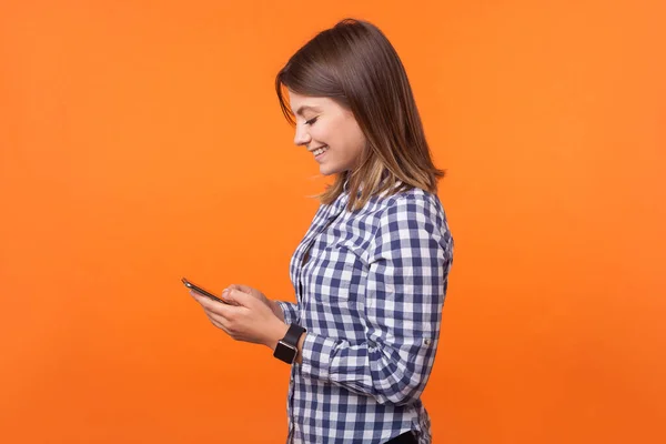 Side view portrait of positive brunette woman with charming smil — Stock Photo, Image