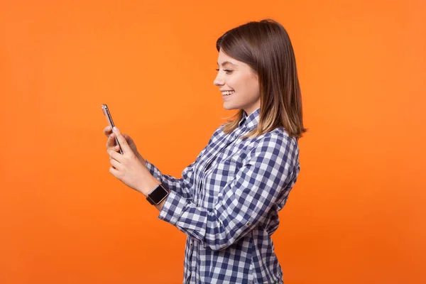 Side view portrait of adorable young brunette woman with charmin — Stock Photo, Image