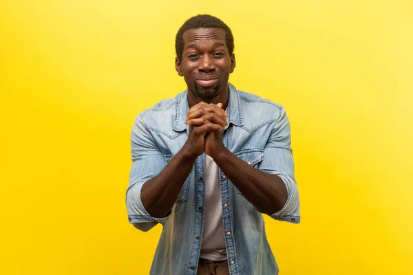 Portrait of hopeless depression young man holding hands in prayer — Stok Foto