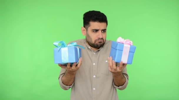 Positive Attractive Young Adult Man Shirt Holding Two Big Gift — Stock Video