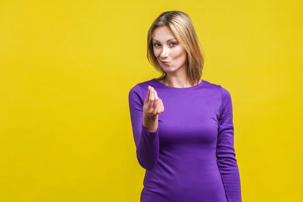 Portrait of elegant businesswoman showing money gesture. indoor — Stockfoto