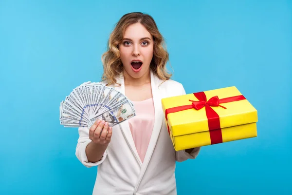 Holiday sales. Portrait of amazed joyous woman holding bunch of — Stock Photo, Image