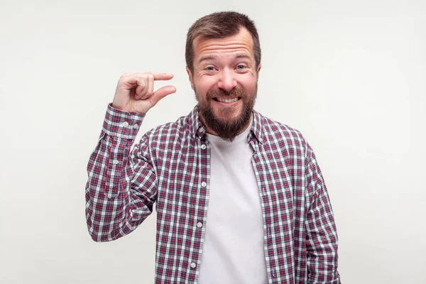 So small size! Portrait of disappointed bearded man showing a li — Stock Photo, Image