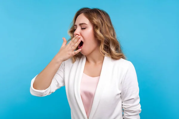 Portrait of fatigued woman yawning feeling sleepy and tired, cov — Stock Photo, Image