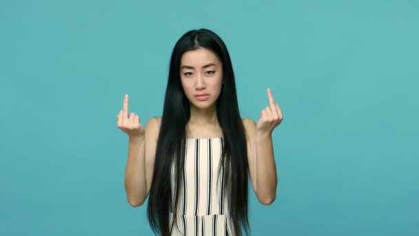 Impolite Annoyed Asian Woman Long Straight Black Hair Showing Middle — Stockvideo