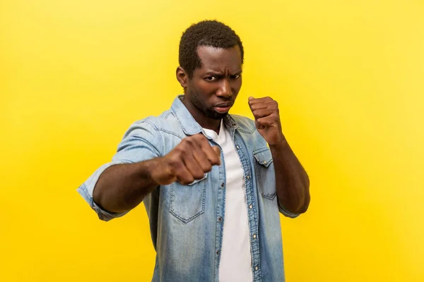 Ready for fight. Portrait of aggressive man standing with clench — Stock Photo, Image