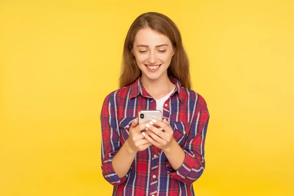 User friendly technology. Portrait of happy girl in shirt typing — 스톡 사진