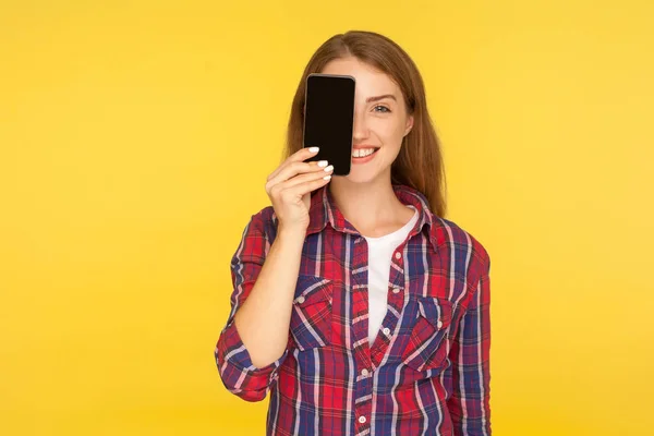 Portrait of excited cheerful girl in shirt covering half head wi — 스톡 사진