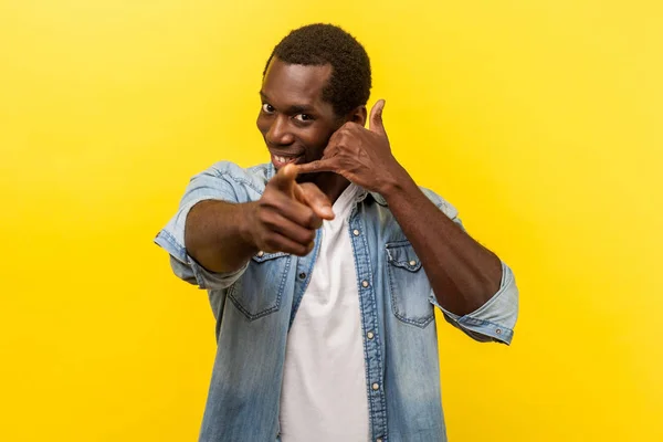 You call me! Portrait of playful man making call me gesture with — Stock Photo, Image