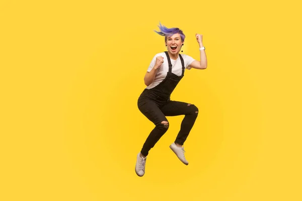 Yes i did it! Portrait of enthusiastic lively hipster girl with