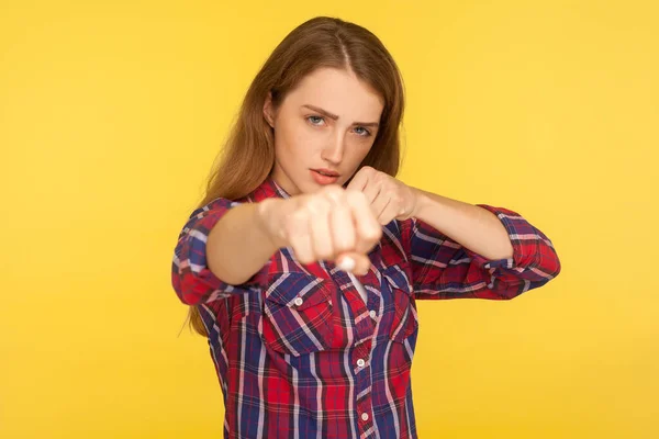 Portrait of strong and determined ginger girl in checkered shirt — Stock Photo, Image