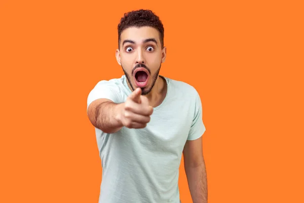 Hey you! Portrait of amazed brunette man pointing finger at came — Stock Photo, Image