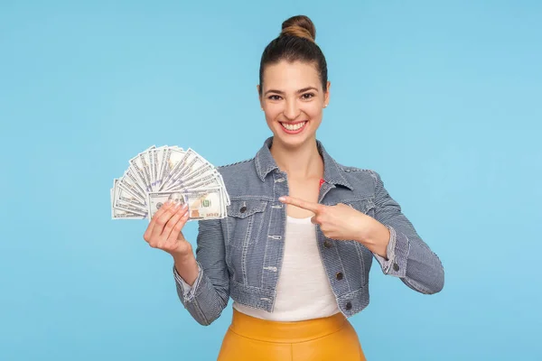 Look at money! Happy excited rich woman with hair bun in modern — 스톡 사진