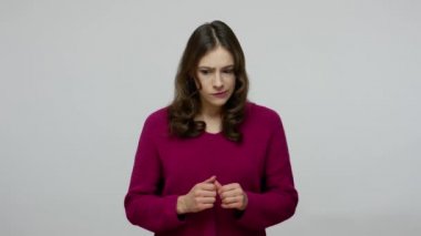 Inspired cheerful nice-looking brunette woman in pullover pointing finger up having excellent idea