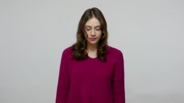 Hello! Charming nice-looking brunette woman in pullover waving hand gesturing hi to camera