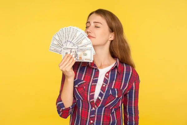 Portrait of rich greedy woman in casual checkered shirt holding — 스톡 사진