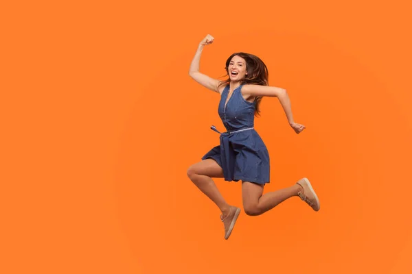Leap to success. Full length of excited energetic motivated brun — Stockfoto