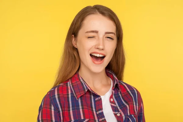 Portrait of cheerful optimistic ginger girl in checkered shirt w — Stockfoto
