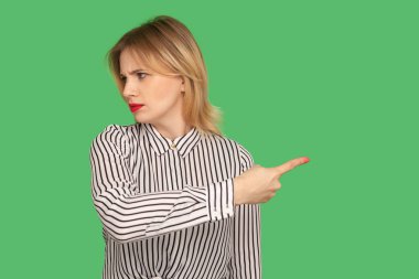 Get out! Dissatisfied annoyed woman with red lips in blouse show