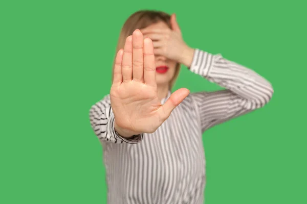 Stop, don't want to look at this! Shy confused girl in striped b — Stok fotoğraf