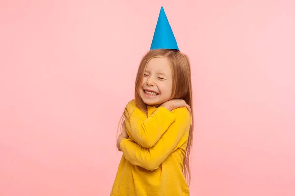 Fascinating Lovely Cute Little Girl Funny Party Cone Head Embracing — Stock Photo, Image