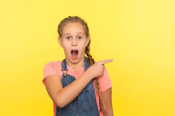 Look Crazy Advertise Portrait Amazed Cute Little Girl Denim Overalls — Stock Photo, Image