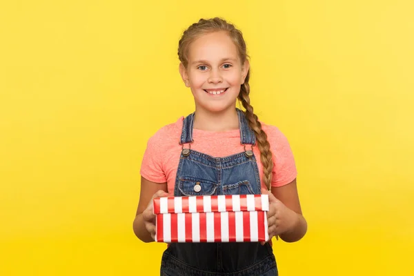 Portrait Excited Glad Little Girl Braid Denim Overalls Holding Gift — Stock Photo, Image