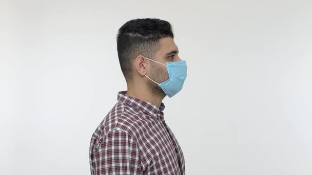 Serious Man Wearing Medical Mask Turning Camera Having Protection Face — Stock Video