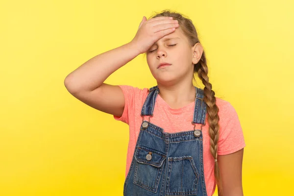 Portrait Forgetful Sad Little Girl Braid Denim Overalls Gesturing Facepalm — Stok Foto