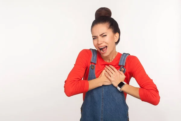 Cardiac Problems Portrait Young Fatigued Woman Hair Bun Denim Overalls — Stock Photo, Image