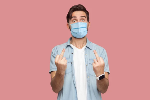 Portrait Angry Young Man Surgical Medical Mask Blue Shirt Standing — Stockfoto