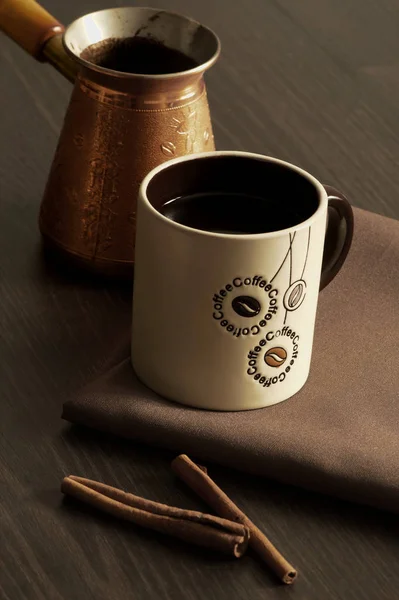 Cup of coffee breakfast drink natural coffee with cinnamon Dark coffee