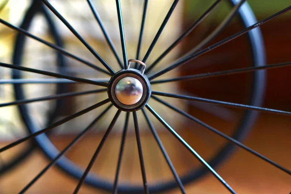 Axis in black color with silver round in the center — Stock Photo, Image