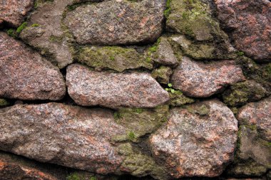 Grafik kaynak. Dokular. Geçmişi. Tasarımcılar için malzeme. Güzel, vahşi sokak taşlarından bir duvar