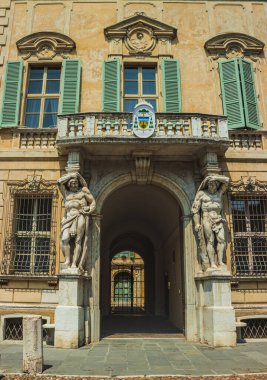 Atlanta on the facade of an old building. Mantua