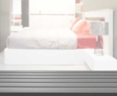 Masa üstü ve bulanıklık arka planda yatak odası