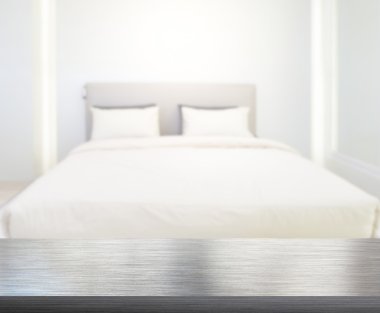 Masa üstü ve bulanıklık arka planda yatak odası