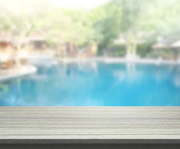 Table Top And Blur Swimming Pool Of Background — Stock Photo, Image