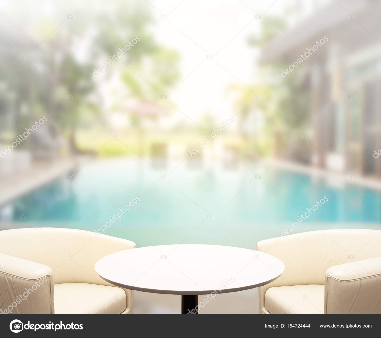 Table Top And Blur Swimming Pool Of Background Stock Photo Table Top And Blur Swimming Pool Of The Background Photo By Nuttapoldpspt