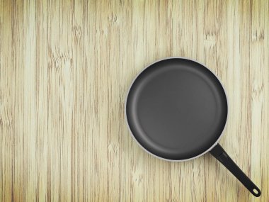 Tablo arka plan üzerinde Üstten Görünüm boş tava