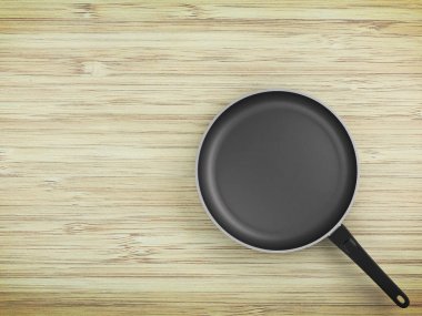 Tablo arka plan üzerinde Üstten Görünüm boş tava