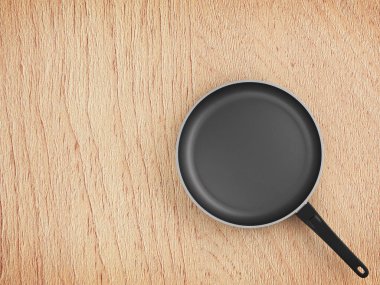 Tablo arka plan üzerinde Üstten Görünüm boş tava