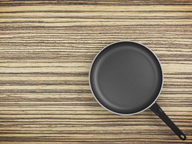 Tablo arka plan üzerinde Üstten Görünüm boş tava