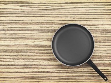 Tablo arka plan üzerinde Üstten Görünüm boş tava