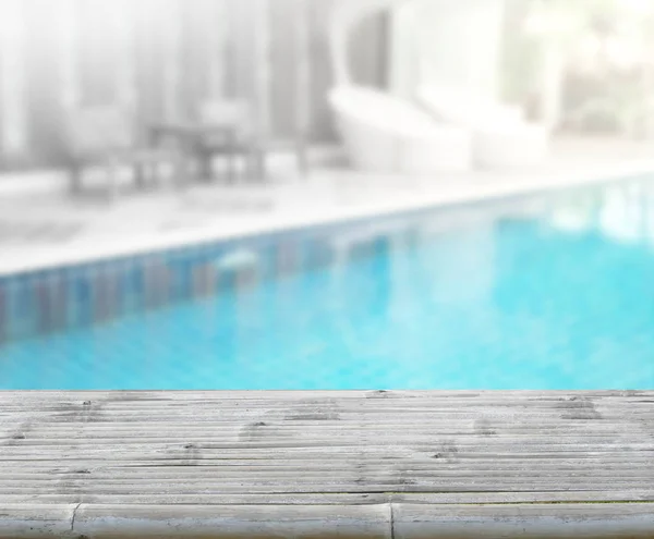 Table Top And Blur Swimming Pool Of Background — Stock Photo, Image